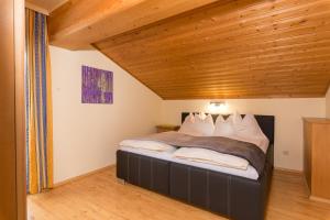 Postel nebo postele na pokoji v ubytování Appartement Roland