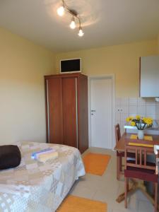Postel nebo postele na pokoji v ubytování Apartments Frakić