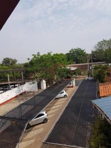a row of cars parked on top of a roof at OKE Apart Hotel in San Lorenzo