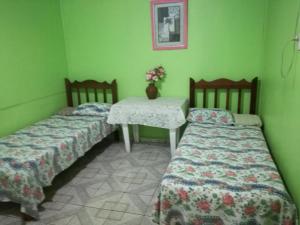 Ένα ή περισσότερα κρεβάτια σε δωμάτιο στο Hotel Margarita Sierpe