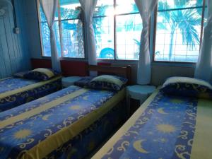 Ένα ή περισσότερα κρεβάτια σε δωμάτιο στο Hotel Margarita Sierpe