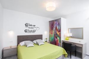 Postel nebo postele na pokoji v ubytování L&L apartments