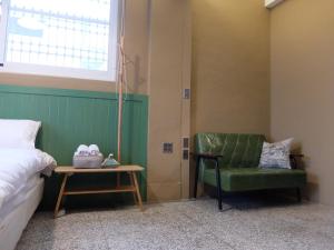 Area soggiorno di Xin Yuan Hang Homestay