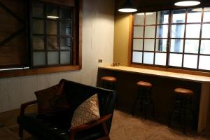 Area soggiorno di Xin Yuan Hang Homestay