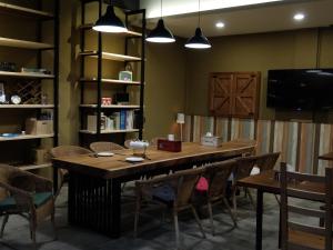 TV o dispositivi per l'intrattenimento presso Xin Yuan Hang Homestay