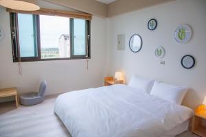 Postel nebo postele na pokoji v ubytování Stay Homestay