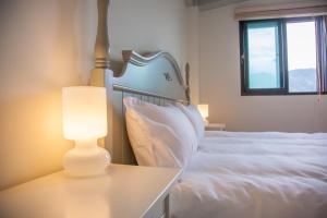 Postel nebo postele na pokoji v ubytování Stay Homestay