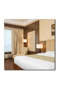 The Cabbana Resort & Spa客房内的一张或多张床位