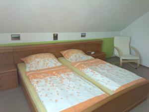 Ліжко або ліжка в номері Holiday Home U Fišerů