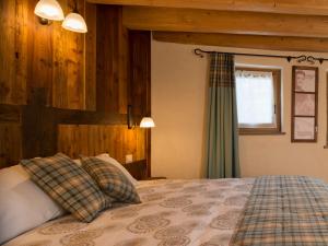 Postel nebo postele na pokoji v ubytování Chambres d'hôtes La Moraine Enchantée
