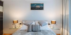 Posteľ alebo postele v izbe v ubytovaní Apartament Morski