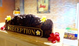 a chocolate cake sitting on top of a counter at Wiki Bali in Ubud +72 photos