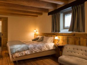 Postel nebo postele na pokoji v ubytování Chambres d'hôtes La Moraine Enchantée