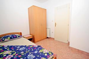 Postel nebo postele na pokoji v ubytování Apartman Diana