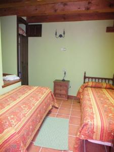 Posteľ alebo postele v izbe v ubytovaní Las Casas del Duraton
