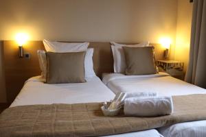 Postel nebo postele na pokoji v ubytování Hotel Le Transat Bleu + 34 fotografií