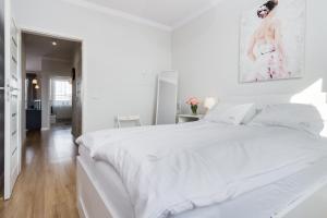 Posteľ alebo postele v izbe v ubytovaní Elite Apartments Marine Suite