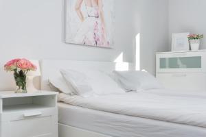 Posteľ alebo postele v izbe v ubytovaní Elite Apartments Marine Suite