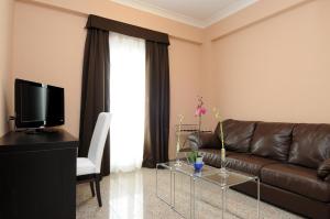Posezení v ubytování EH Suites Rome Airport Euro House Hotels