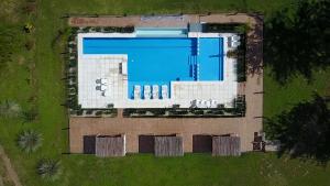 an aerial view of a building with a swimming pool at Casonas de Nono in Nono