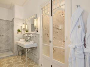 Kúpeľňa v ubytovaní Hotel Gloria de Sant Jaume