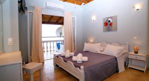 A bed or beds in a room at Baracunda Apartments