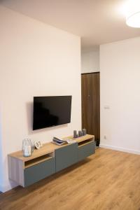 Telewizja i/lub zestaw kina domowego w obiekcie Apartamenty City View od WroclawApartament-pl