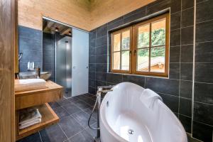 Koupelna v ubytování LA SOA Chalets & Eventlodge