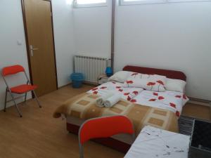 Postel nebo postele na pokoji v ubytování Hostel Poslon