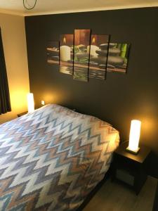 Un pat sau paturi într-o cameră la La Cime des chodes 2