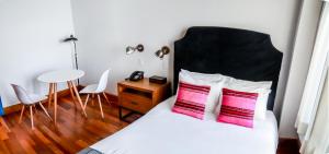 Cama ou camas em um quarto em Las Clementinas