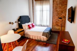Cama ou camas em um quarto em Las Clementinas