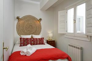 Postel nebo postele na pokoji v ubytování Apartamentos Mirador Alhambra