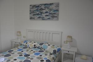 Postel nebo postele na pokoji v ubytování "A Livanti" B&B
