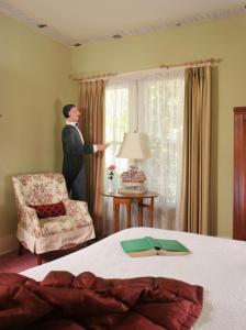 Säng eller sängar i ett rum på Spencer Hotel & Spa Chautauqua