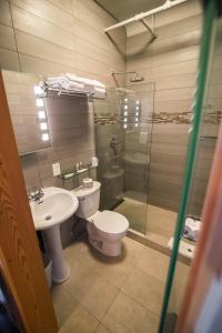 Vannituba majutusasutuses Adventure Hotel