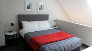 Postel nebo postele na pokoji v ubytování Bay Palm Motel