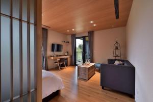 TV a/nebo společenská místnost v ubytování Shan Yi Fang Resort + 37 fotografií