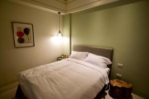 Postel nebo postele na pokoji v ubytování Sakagami Hotel