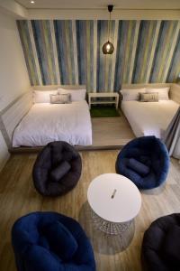 Postel nebo postele na pokoji v ubytování Sakagami Hotel