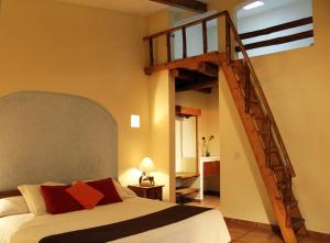 Postel nebo postele na pokoji v ubytování Hotel Posada Real Tapalpa