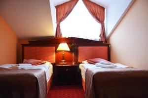 Posteľ alebo postele v izbe v ubytovaní Hotel Adam & Spa