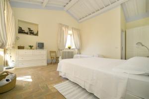 Кровать или кровати в номере Villa Santa Barbera