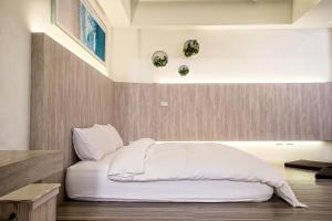 Postel nebo postele na pokoji v ubytování ManMan B&B