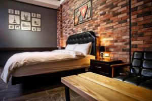 Postel nebo postele na pokoji v ubytování ManMan B&B