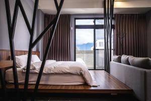 Postel nebo postele na pokoji v ubytování ManMan B&B