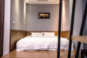 Postel nebo postele na pokoji v ubytování ManMan B&B