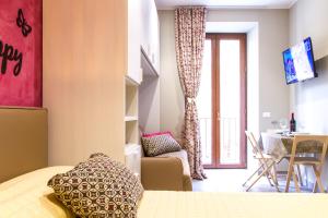 Un televizor și/sau centru de divertisment la Suite Bordonaro Apartments