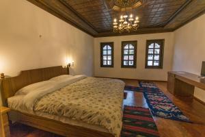 Postel nebo postele na pokoji v ubytování Hotel Onufri