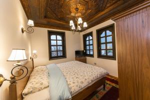 Postel nebo postele na pokoji v ubytování Hotel Onufri